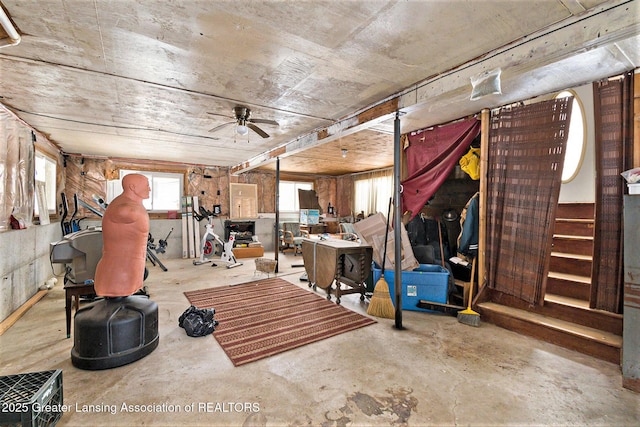 basement featuring ceiling fan