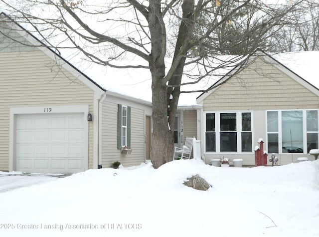 view of snow covered property