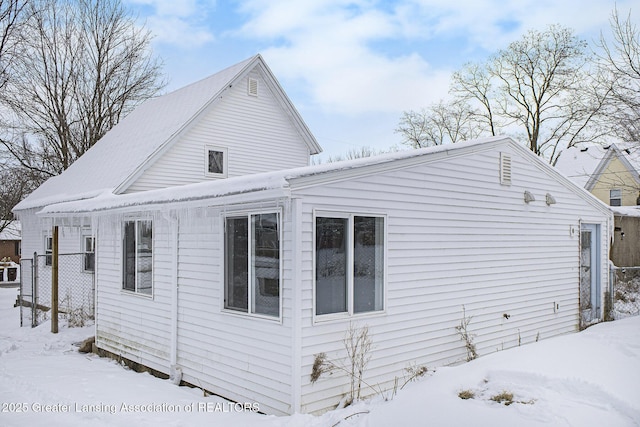 view of snow covered property