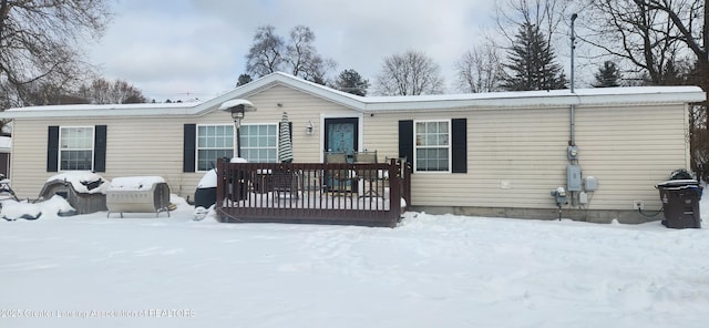 view of front of property featuring a deck