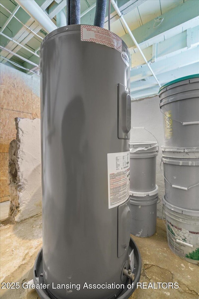 utility room featuring electric water heater