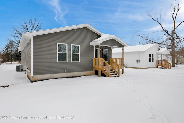 view of front of property with cooling unit