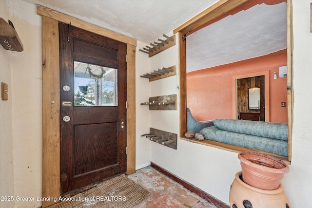 entrance foyer featuring baseboards