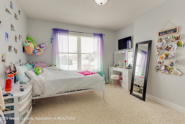 bedroom featuring baseboards