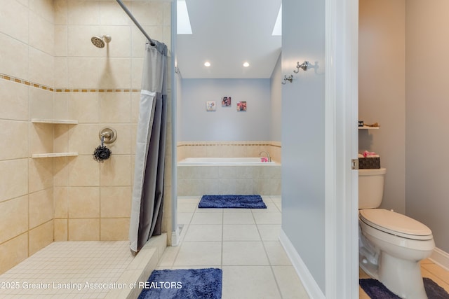 full bath with toilet, a shower stall, a bath, and tile patterned floors