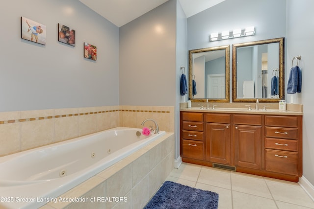 full bath featuring double vanity, visible vents, a sink, tile patterned flooring, and a jetted tub