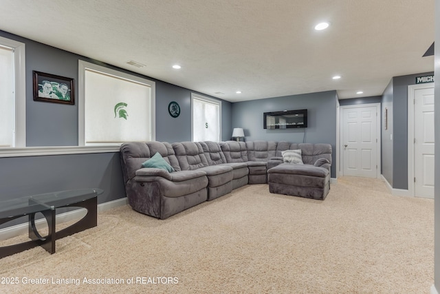 living area with baseboards, light colored carpet, visible vents, and recessed lighting