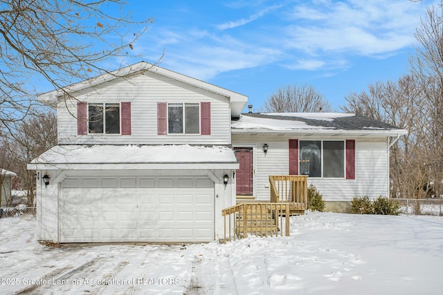 split level home featuring an attached garage