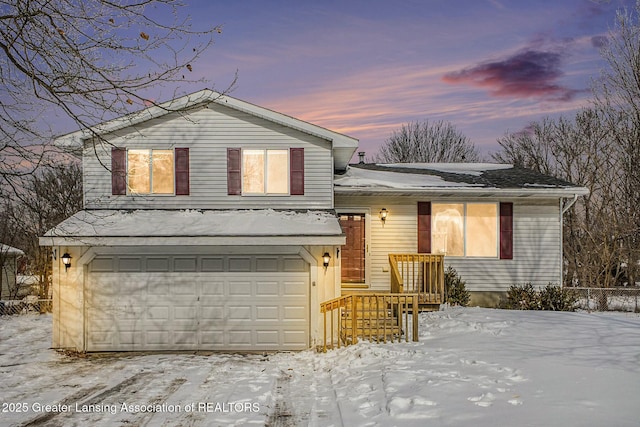 split level home with a garage