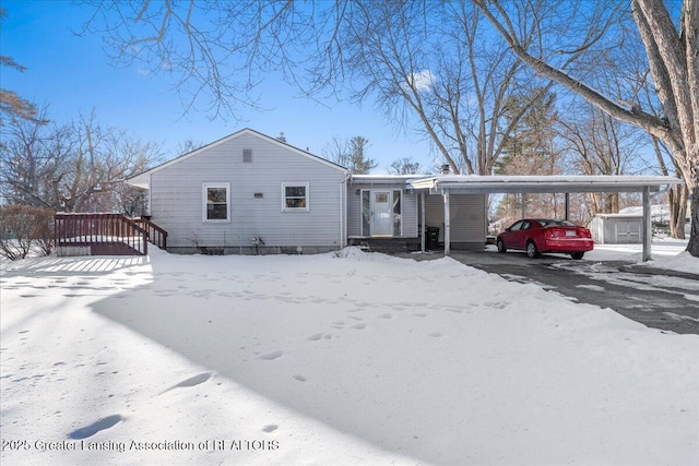 view of front of house featuring a carport