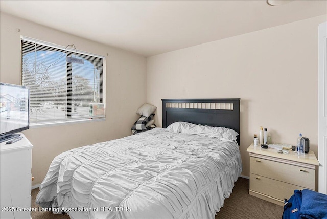 bedroom featuring light colored carpet