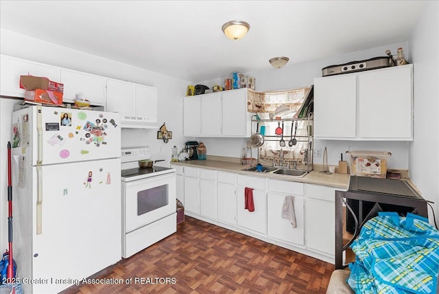 kitchen featuring light countertops, white cabinets, a sink, white appliances, and under cabinet range hood