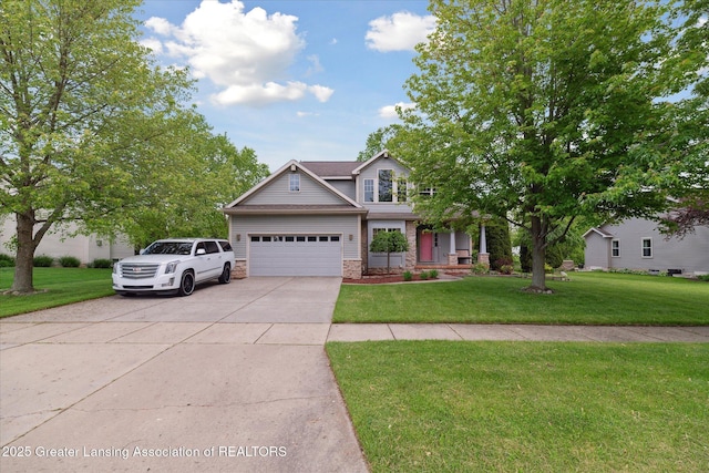 11610 Hibiscus Ln, Grand Ledge, MI 48837 - view of front facade with driveway, a front lawn, a garage, and roof with shingles