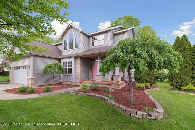 11610 Hibiscus Ln, Grand Ledge, MI 48837 - view of front of home with a porch, stone siding, a front lawn, driveway, and a garage