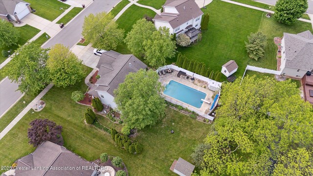 11610 Hibiscus Ln, Grand Ledge, MI 48837 - view of property location with nearby suburban area and a pool