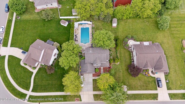 11610 Hibiscus Ln, Grand Ledge, MI 48837 - aerial view of property's location with a pool