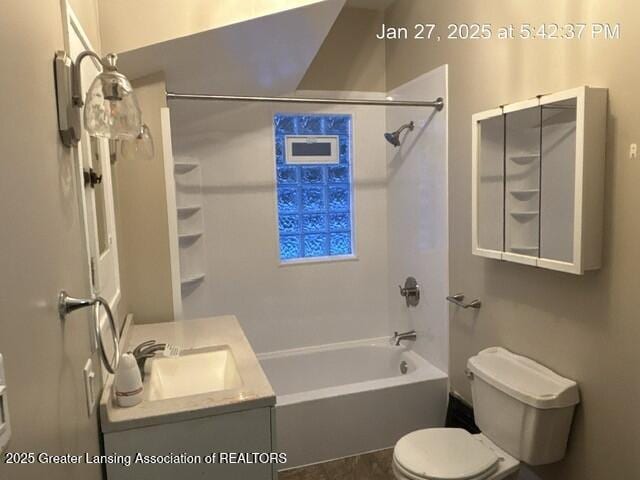 full bath featuring toilet, shower / washtub combination, and vanity