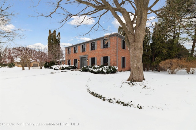 exterior space with brick siding