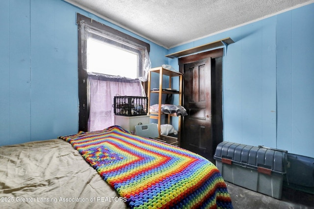 bedroom featuring a textured ceiling