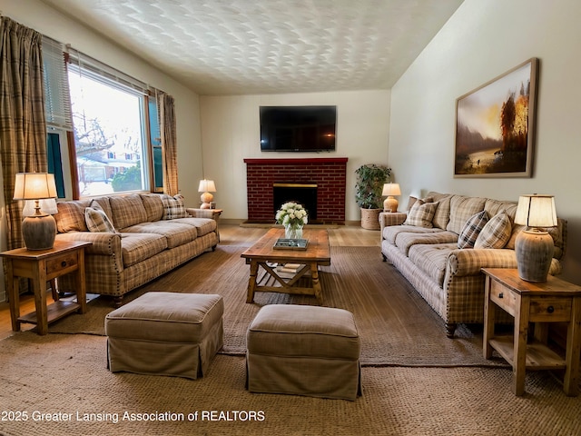 living room featuring a fireplace