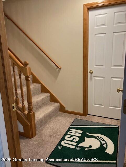 stairway with baseboards