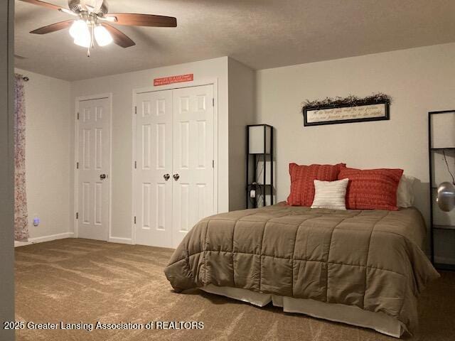 bedroom with a ceiling fan, carpet, a closet, and baseboards