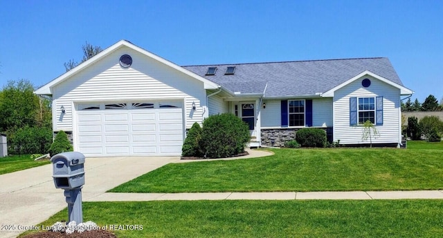 ranch-style house featuring an attached garage, driveway, a front lawn, and a shingled roof