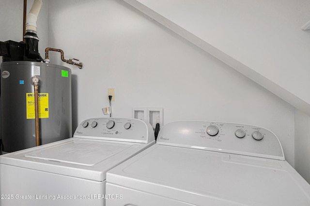 washroom featuring laundry area, separate washer and dryer, and gas water heater