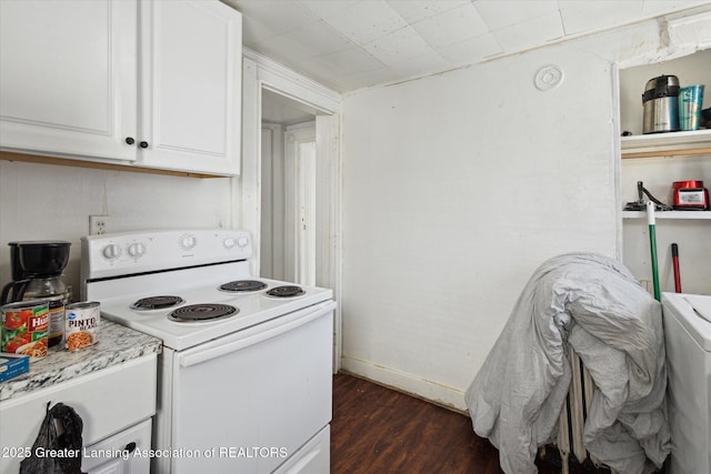 kitchen with washer / dryer, baseboards, electric stove, dark wood-style flooring, and white cabinetry