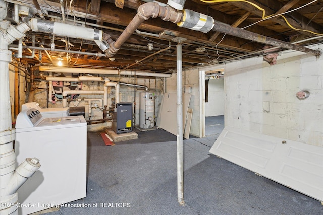 unfinished below grade area featuring water heater, a heating unit, and washer and dryer