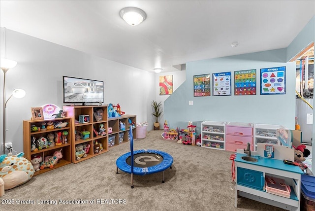 game room with carpet and electric water heater