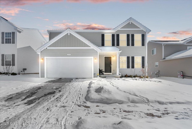 view of front of property with a garage