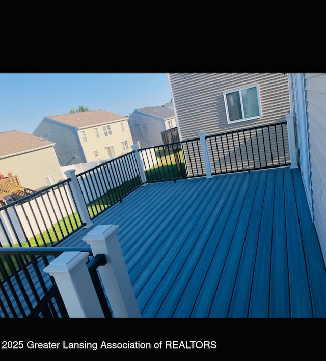 deck with a residential view