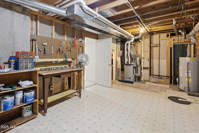 unfinished basement featuring water heater, heating unit, and a workshop area