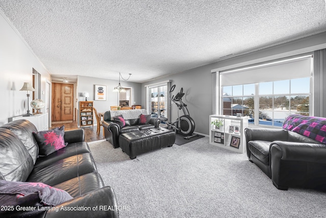 living area featuring a textured ceiling and carpet flooring