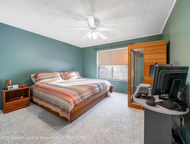 carpeted bedroom with crown molding, a textured ceiling, and ceiling fan