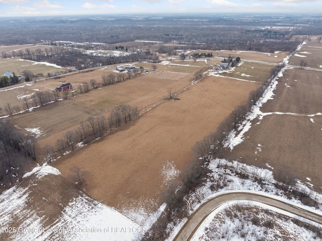 snowy aerial view with a rural view