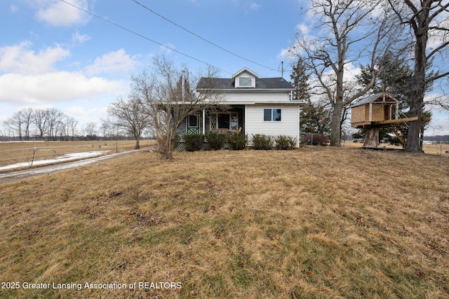 view of front facade with a porch and a front yard