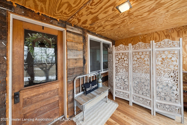 interior space featuring wood ceiling