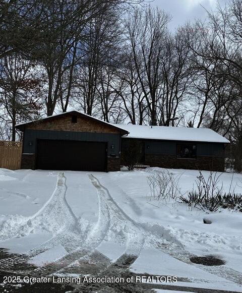 view of front of home with fence