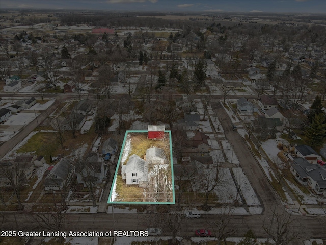 birds eye view of property with a residential view