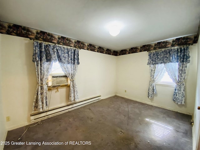 unfurnished room featuring a baseboard radiator, cooling unit, and baseboards