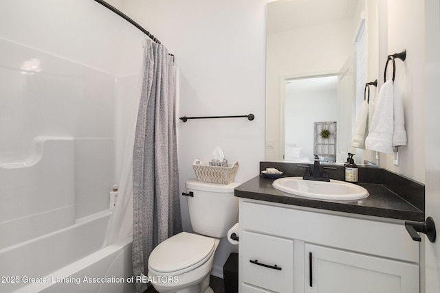 full bathroom featuring toilet, shower / bathtub combination with curtain, and vanity