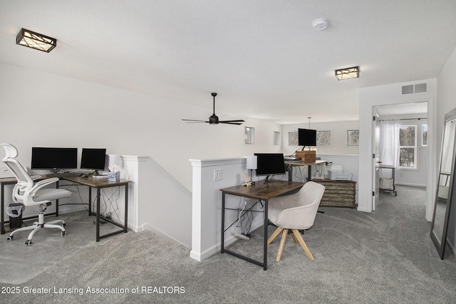 carpeted home office featuring visible vents