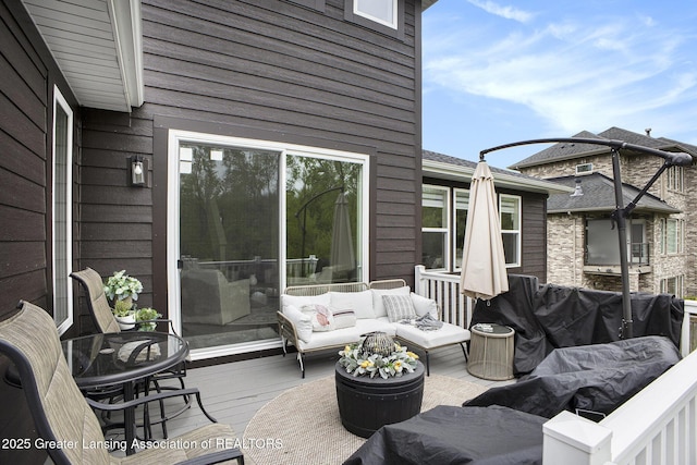 4125 Harbour Cv, Lansing, MI 48911 - wooden terrace with outdoor lounge area