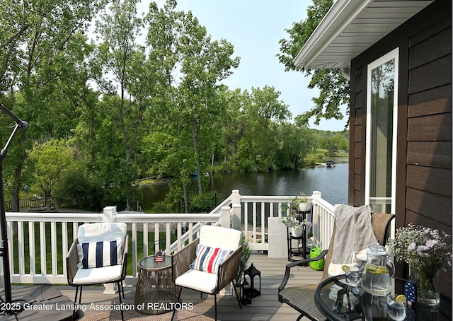 4125 Harbour Cv, Lansing, MI 48911 - wooden terrace with a water view