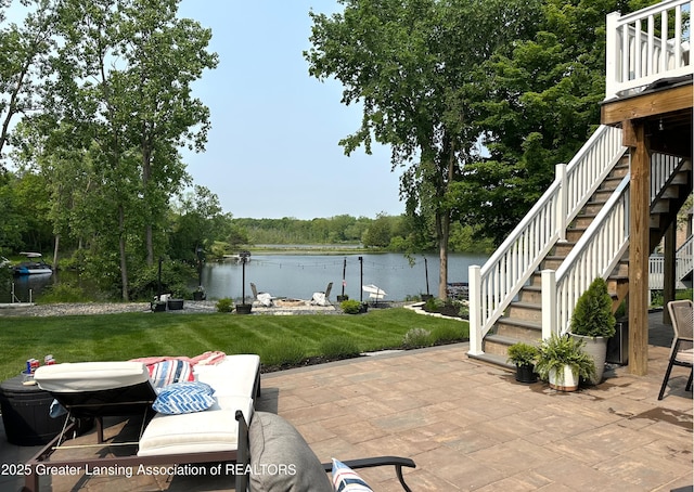 4125 Harbour Cv, Lansing, MI 48911 - view of patio featuring stairway and a water view