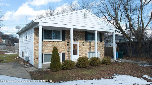 raised ranch with brick siding