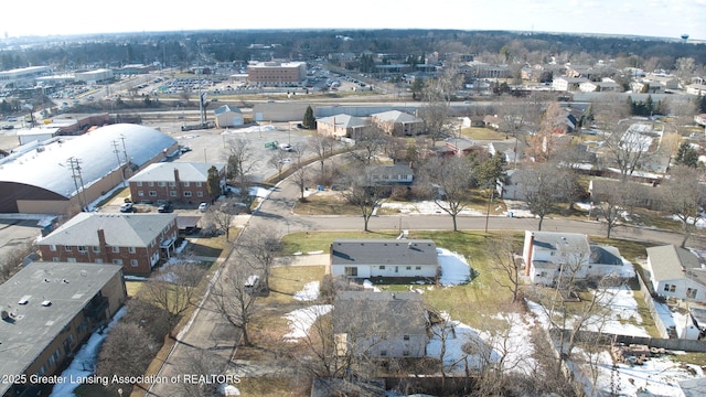 birds eye view of property with a residential view