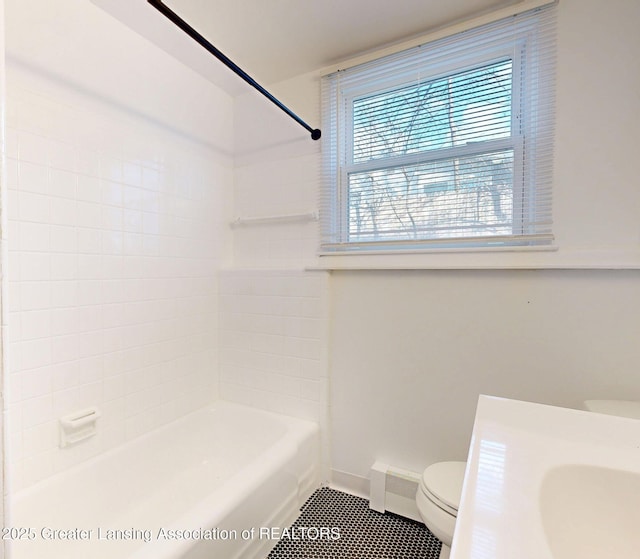 full bath with toilet, a baseboard heating unit, shower / tub combination, tile patterned flooring, and baseboards